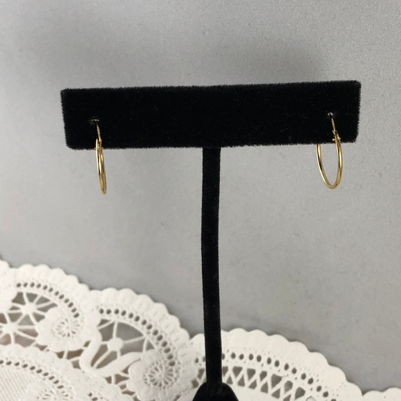 Small 14 Karat solid yellow Gold Huggie Hoops - Picture 3 of 5